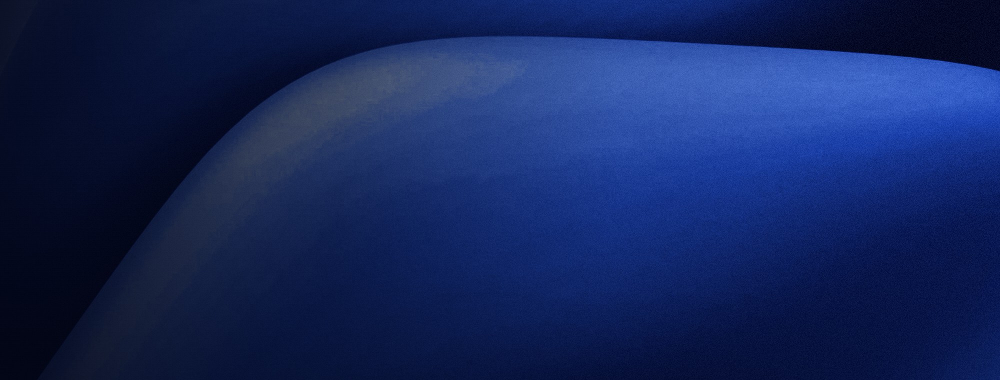 Forma abstracta curva en degradado azul